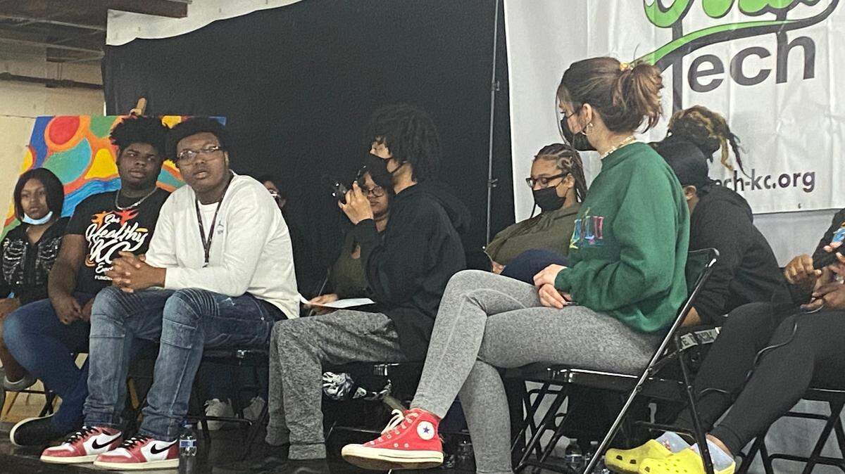 Marcelles Heart, center, an 18-year-old student at Northeast High School, speaks Wednesday during a panel held at Artstech in downtown Kansas City. The discussion was led by area teenagers who discussed how violence impacts young people.
