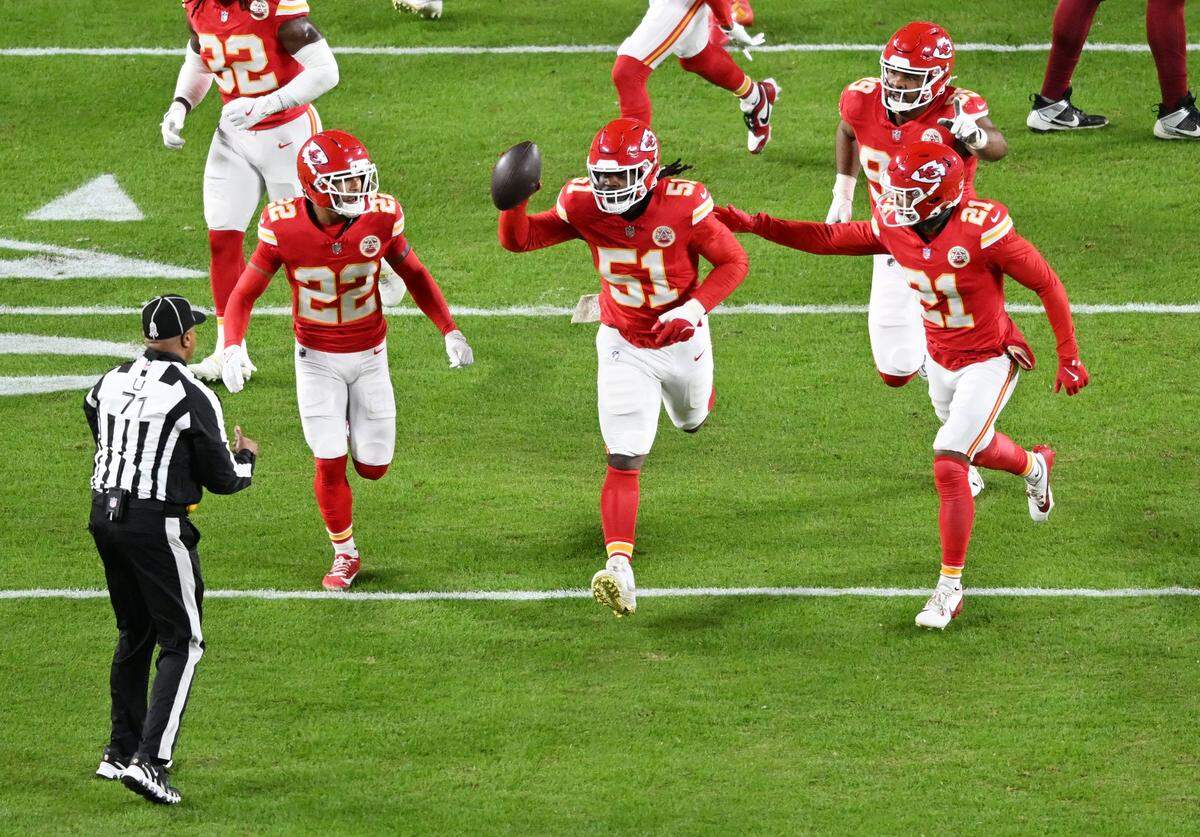 Kansas City Chiefs defensive end Mike Danna (51) celebrates after intercepting a pass intended for Washington Commanders wide receiver Deebo Samuel in the first quarter on Monday, Oct. 27, 2025, at GEHA Field at Arrowhead Stadium.