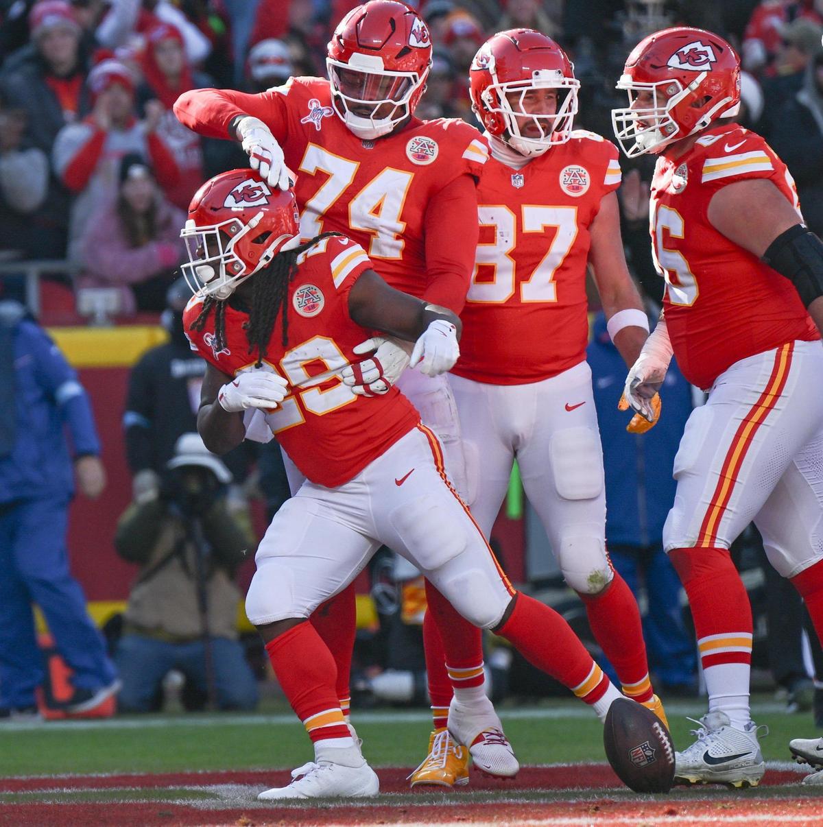 Kansas City Chiefs running back Kareem Hunt (29) celebrates with teammates after scoring a touchdown in the second quarter against the Houston Texans on Saturday Dec. 21, 2024, at GEHA Field at Arrowhead Stadium.