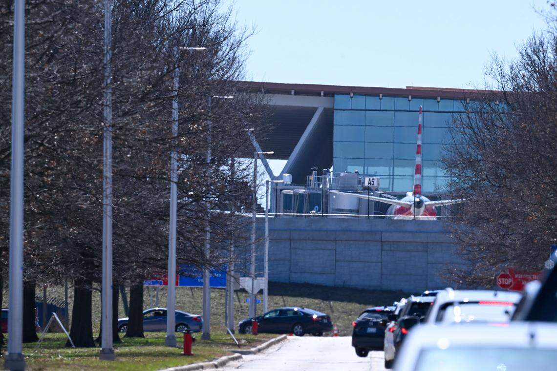 Cars begin moving back toward the Kansas City International Airport following an evacuation over a potential bomb threat on Sunday, March 8.