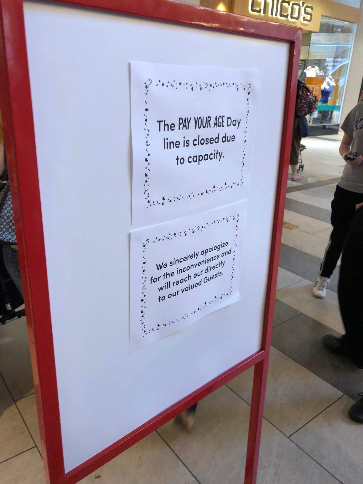 A sign at Oak Park Mall announcing the Build-A-Bear line was closed.