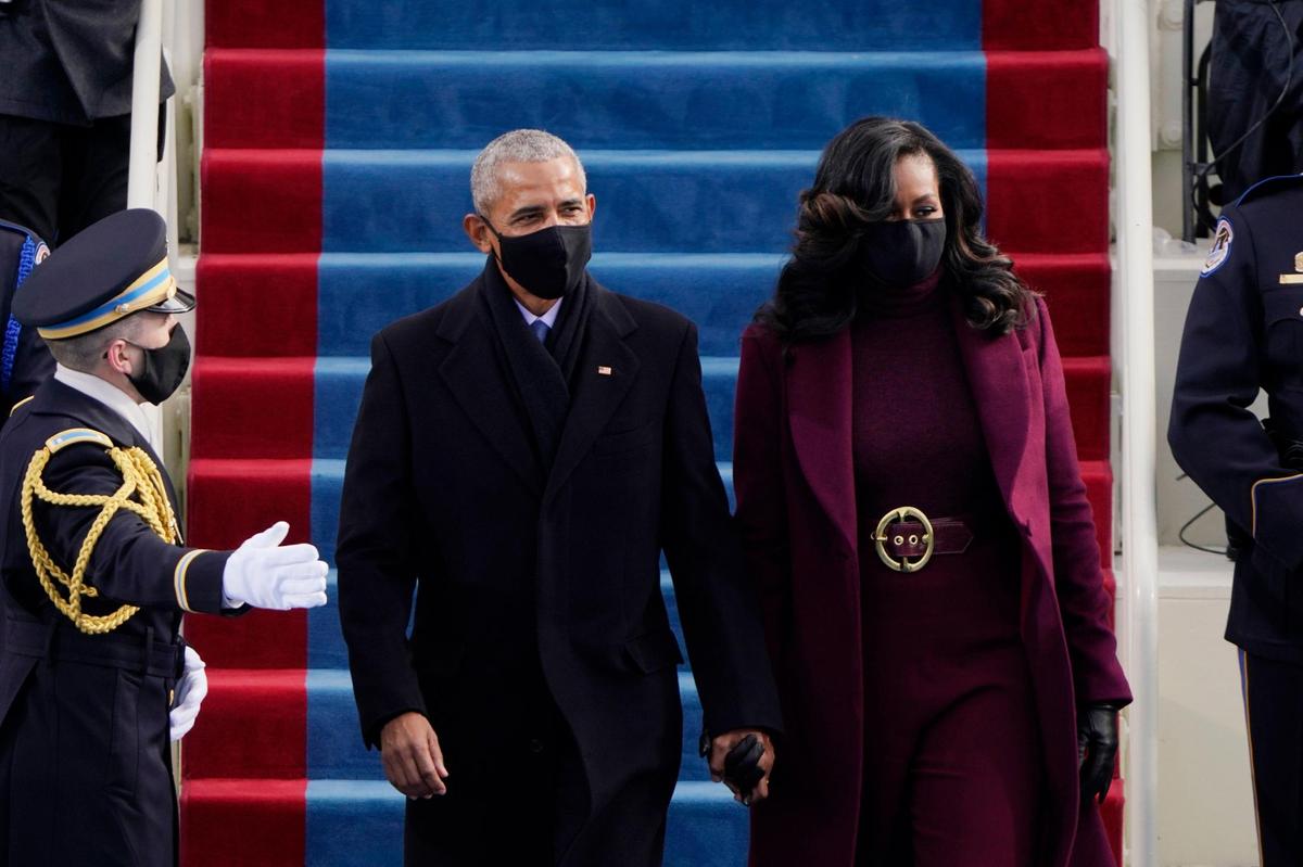 Former President Barack Obama and his wife Michelle arrive for the 59th Presidential Inauguration at the U.S. Capitol for President-elect Joe Biden in Washington, Wednesday, Jan. 20, 2021.