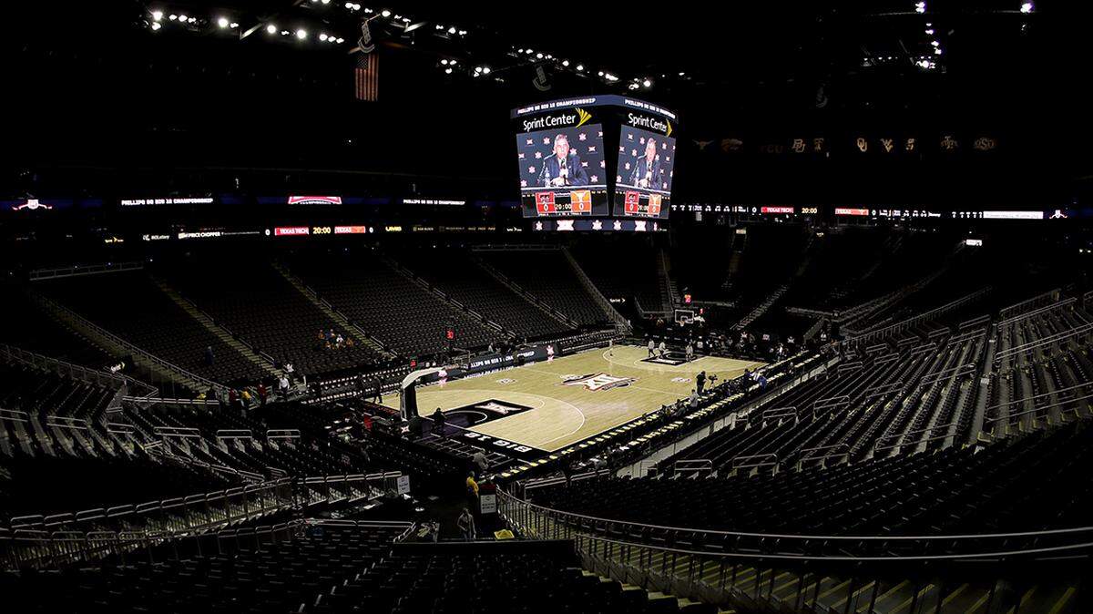 Big 12 commissioner Bob Bowlsby is seen on the big screen in an empty Sprint Center as he talks to the media after canceling the remaining NCAA college basketball games in the Big 12 Conference tournament due to concerns about the coronavirus Thursday, March 12, 2020, in Kansas City, Missouri.