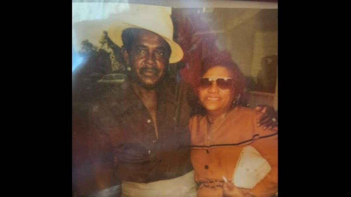 Nellie Bland and her husband, Sammy Bland, smile for a photo. They lived together happily in Olathe for many years; she helped prepare meals in the Olathe School District, and he was a concrete layer.