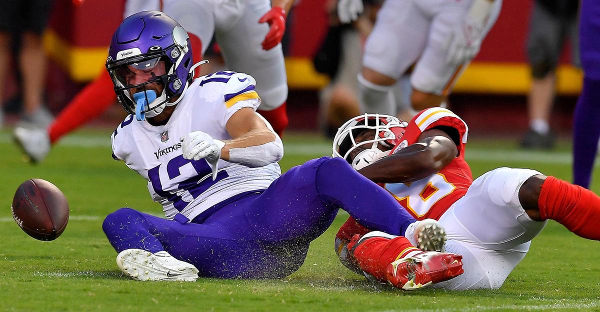 Chiefs cornerback L ‘Jarius Sneed, right, knocked a pass away from Minnesota’s Chad Beebe during the first half of Friday night’s preseason game at Arrowhead Stadium.
