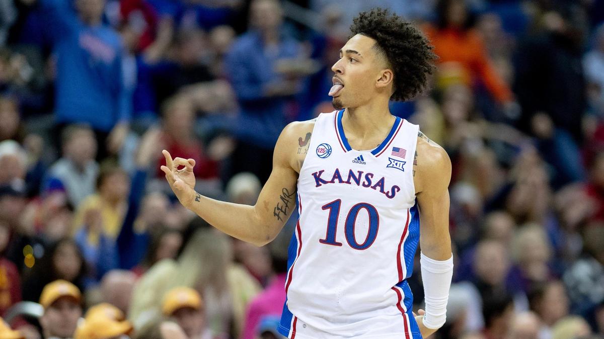 Kansas forward Jalen Wilson (10) celebrates a three-pointer against Iowa State during a game in the semifinal round of the Big 12 Conference tournament Friday, March 10, 2023, in Kansas City.