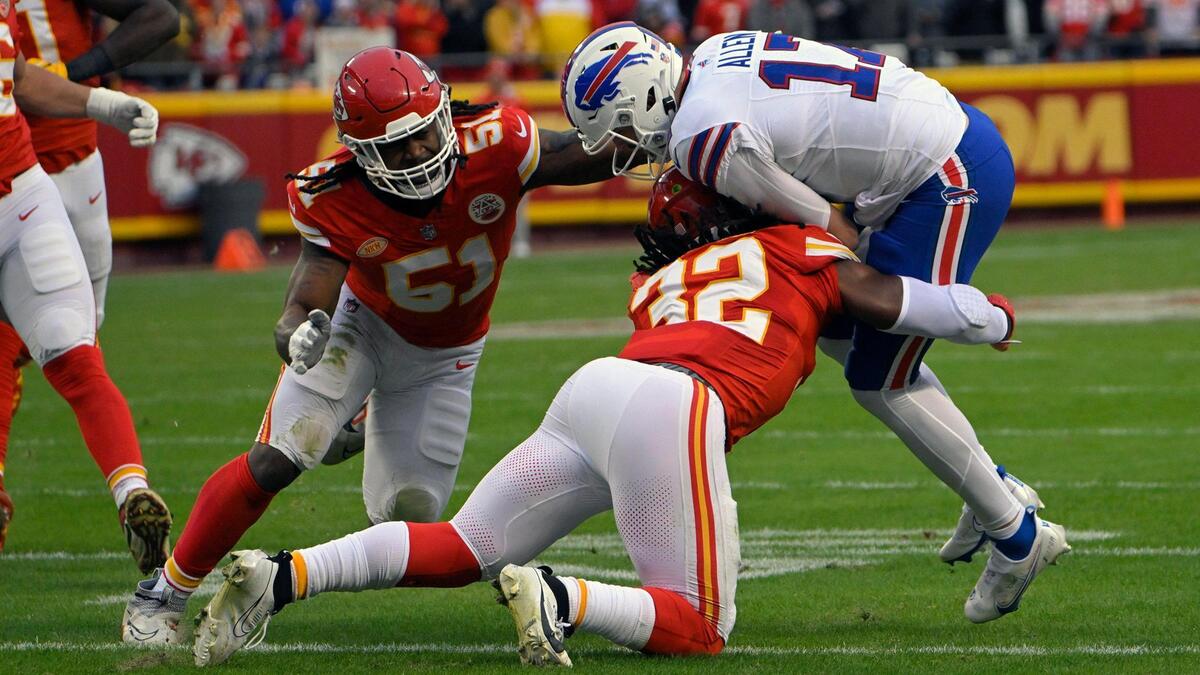 Kansas City Chiefs linebacker Nick Bolton (32) sacks Buffalo Bills quarterback Josh Allen (17) in the first half on on Sunday, Dec. 10, 2023, at GEHA Field at Arrowhead Stadium.