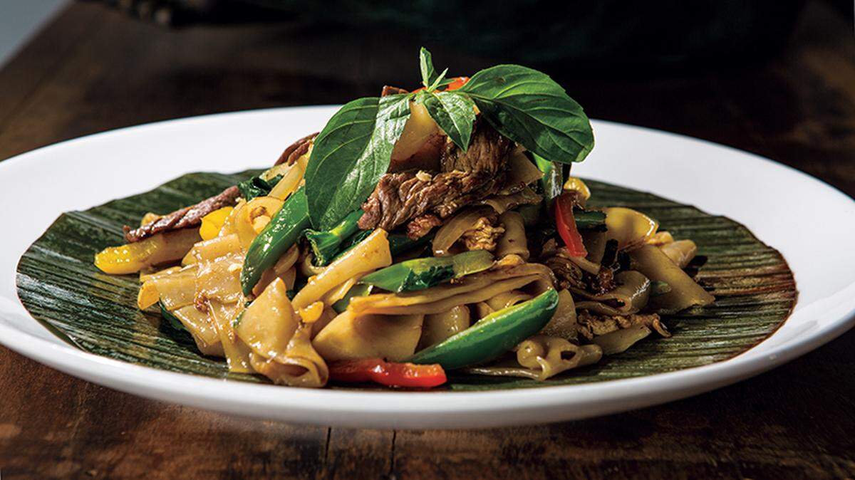Fresh flat noodles are the base of Waldo Thai Place’s Phad Kee Mow TaoHoo PukRuam, a hearty vegetarian dish made with seasonal veggies, tofu, eggs, peppers, onions and Chinese broccoli.
