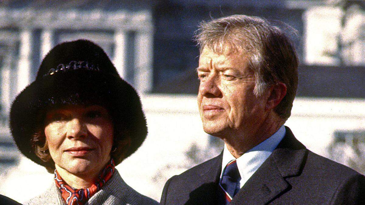 Prime Minister Margaret Thatcher of the United Kingdom, left, is shown as she spoke at the arrival ceremonies in her honor at the White House in Washington, D.C. on Monday,December 17, 1979. In her remarks she praised United States President Jimmy Carter’s, right, handling of the Iran hostage crisis by saying he has gained respect around the world for his courage and patience.  First lady Roslyn Carter, center, looks on.  Thatcher died from a stroke at 87 on Monday, April 8, 2013. Photo Credit: Benjamin E. “Gene” Forte/CNP/AdMedia/Sipa USA