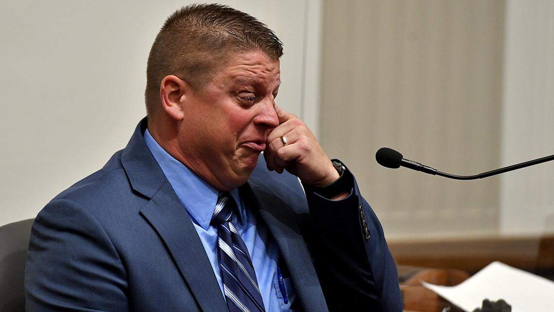 Eric DeValkenaere, a Kansas City, Missouri police detective, cried as he testified in court about what he said led up to the shooting of Cameron Lamb.  DeValkenaere was found guilty of involuntary manslaughter and armed criminal action in the death of Lamb on Dec. 3, 2019.