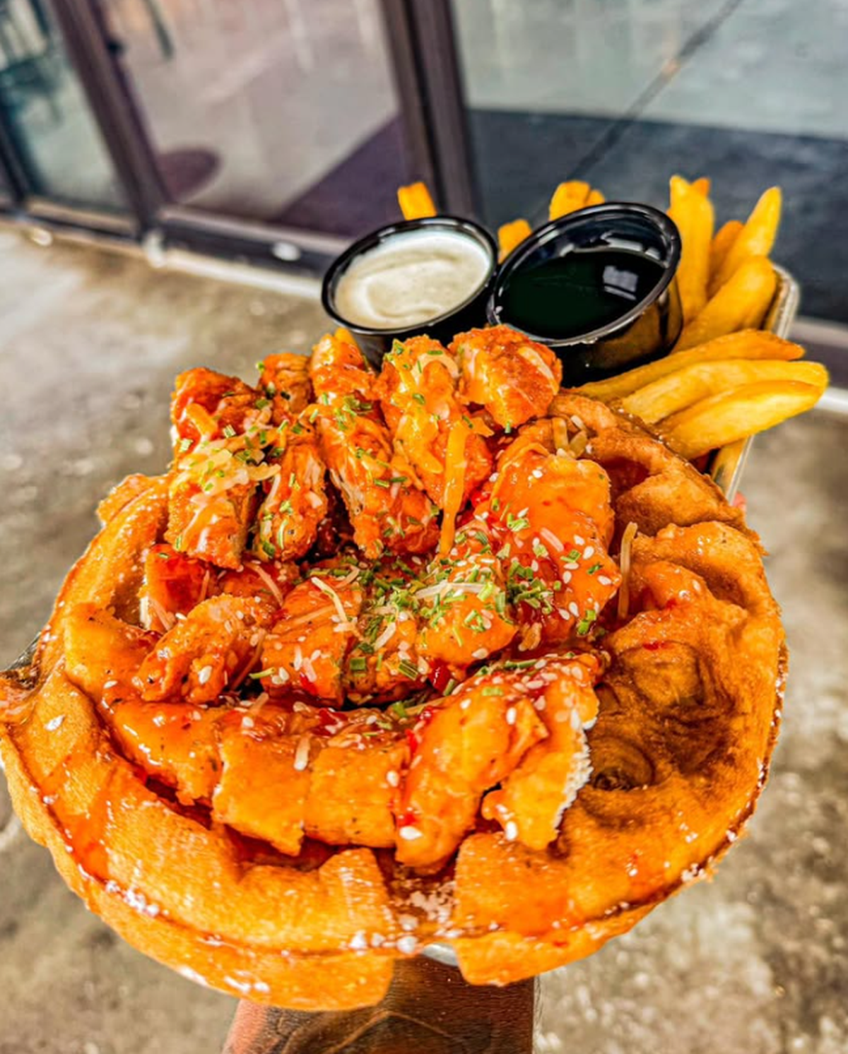 Chick-In Waffle sells a variety of chicken and waffles, loaded fries, shakes and more.
