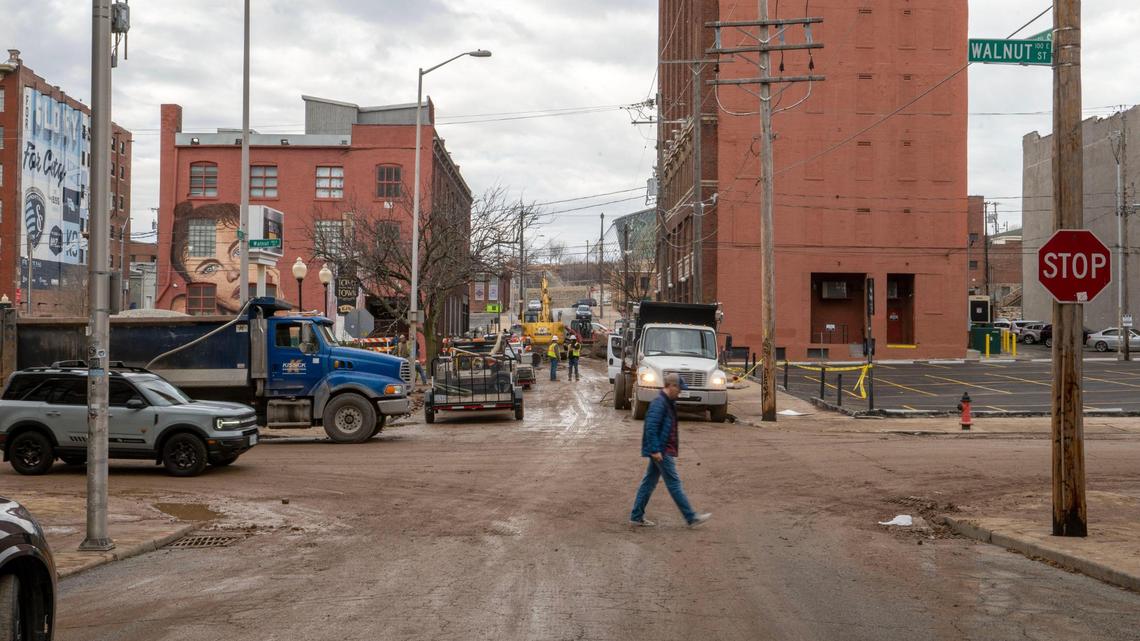 Crew members from Kissick Construction work to repair a 30-inch water main break on Saturday, Dec. 31, 2022, in Kansas City. The main broke Friday night near the corner of Walnut Street and East 17th Street when a vehicle struck a fire hydrant.