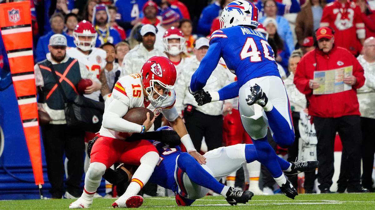 Buffalo Bills linebacker Terrel Bernard (43) sacks Kansas City Chiefs quarterback Patrick Mahomes (15) along with Buffalo Bills linebacker Von Miller (40) during the first half at Highmark Stadium.