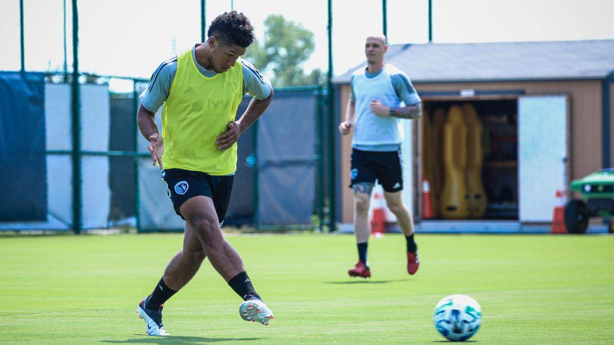 Jaylin Lindsey, left, has seen increasing playing time this season. It’s clear he has earned the trust of Sporting KC coach Peter Vermes.