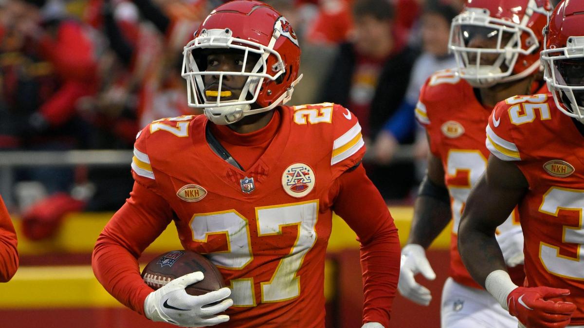 Chiefs safety Chamarri Conner cradles the ball after hauling in his first NFL interception against the Buffalo Bills last weekend at GEHA Field at Arrowhead Stadium.