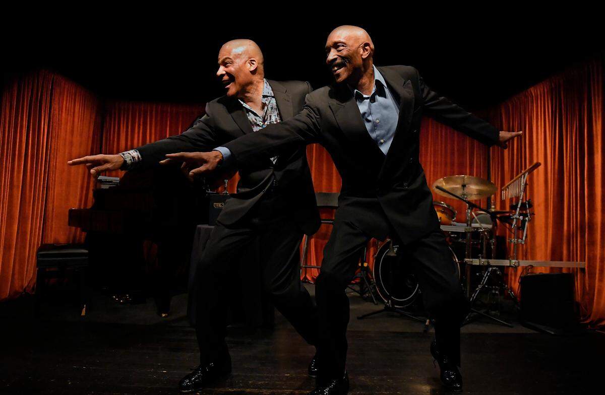 Lonnie, left, and Ronald McFadden play trumpet and trombone and sing, but what sets them apart is their tap dancing.