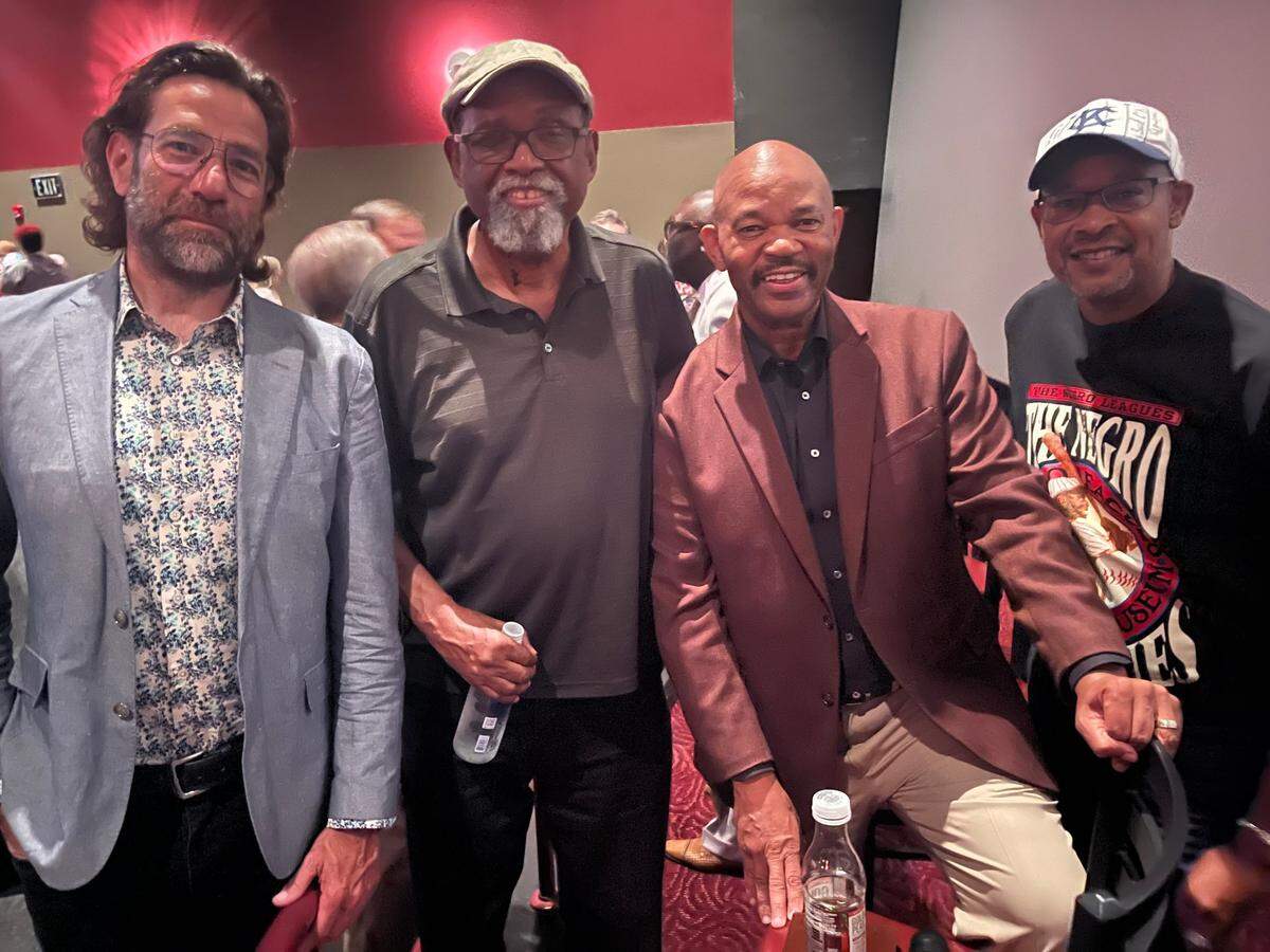 Left to right: Producer Dave Sirulnick, director Sam Pollard, author Phil Dixon and producer Byron Motley pose at the premiere for “The League.”