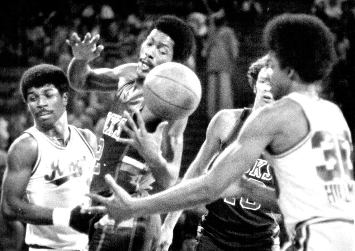 A loose ball after a blocked shot on an attempt by Darnell Hillman (right) of the Kings brought on this scramble under the Kansas City basket on Feb. 22, 1979, at Kemper Arena. Phil Ford (left), distracted by the movement of Junior Bridgeman's right arm, looked elsewhere momentarily but John Gianelli of Milwaukee focused on the ball, which seemed headed for Bridgeman's grasp.