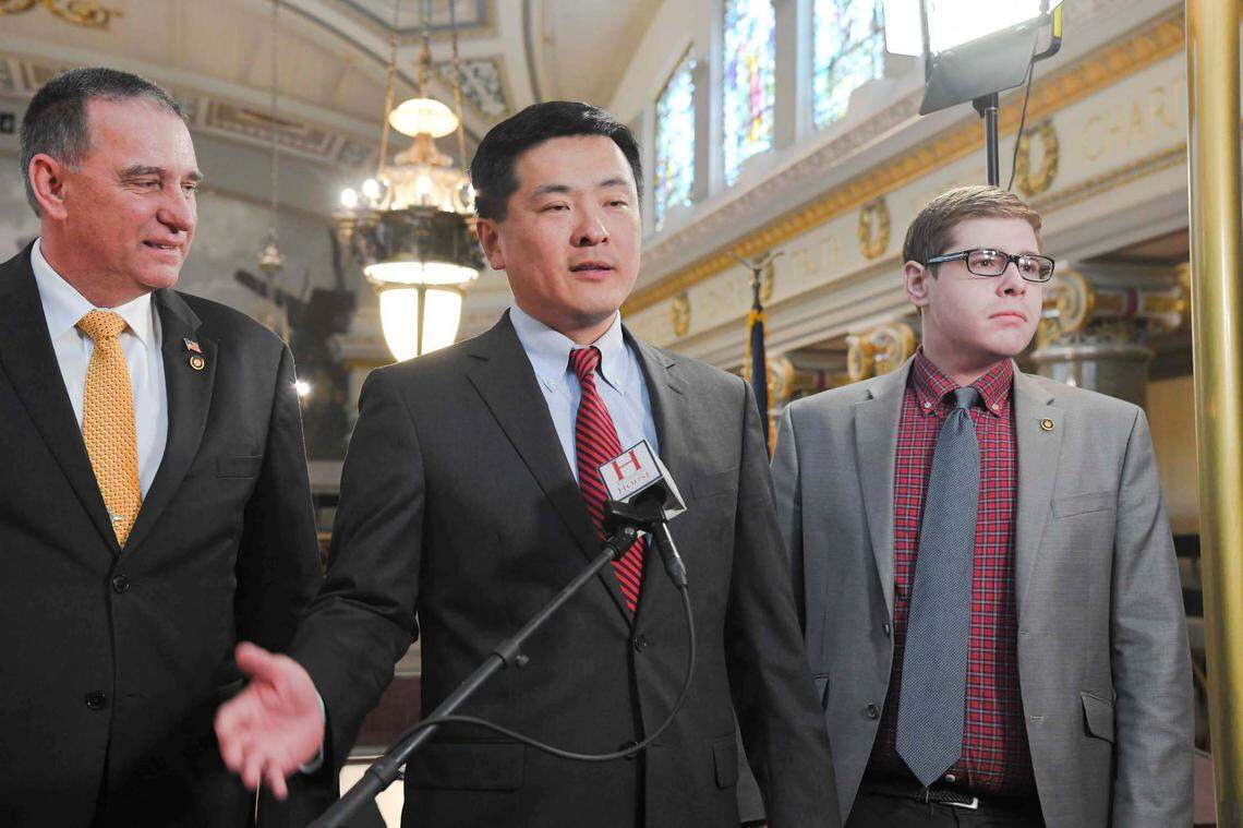 Missouri House Majority Leader Jonathan Patterson, center.