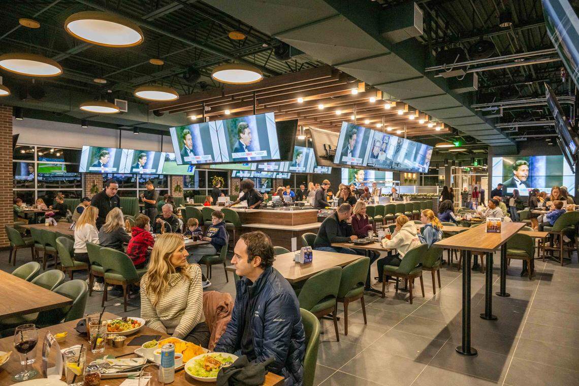 The dining and bar area at Tap-Ins at the Greenhouse, a new restaurant/mini golf concept in Overland Park, on Wednesday, December 3, 2025.