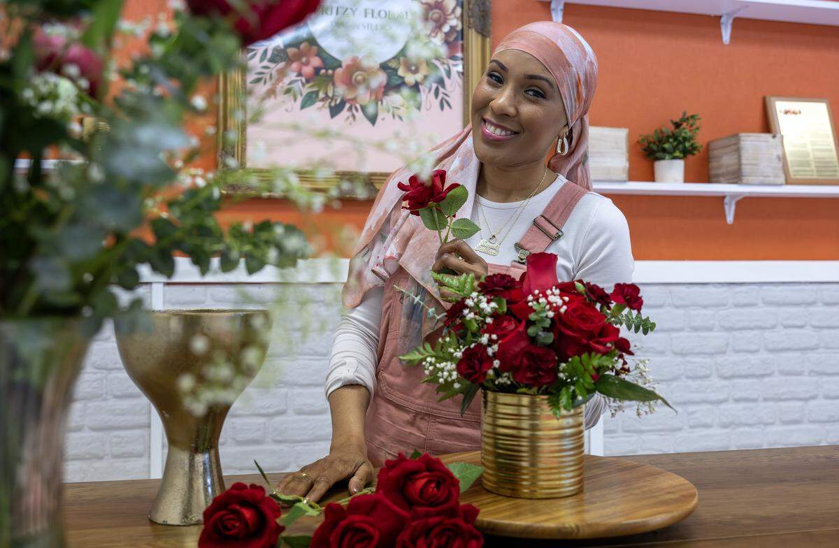 Shahidah Salaam, owner of Pritzy Floral Design Studio, stands for a portrait on Thursday, Jan. 8, 2026, in Grandview.