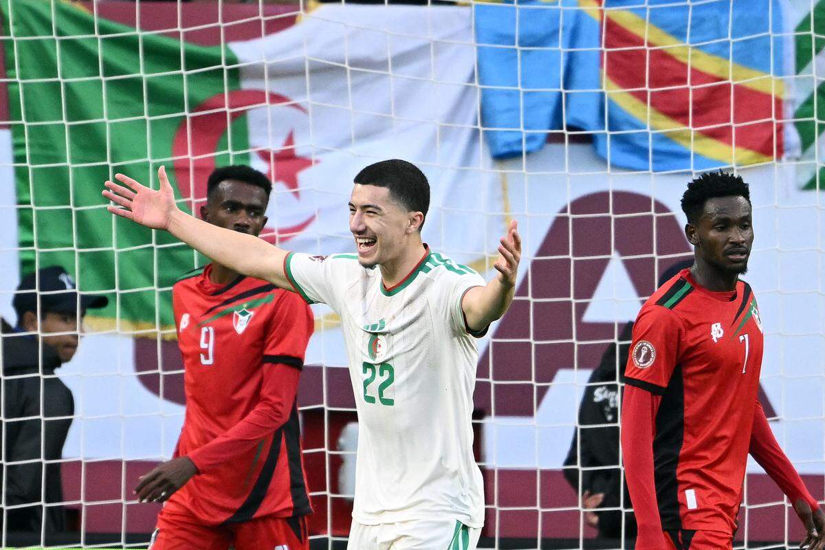 Algeria midfielder #22 Ibrahim Maza (C) celebrates scoring the team’s third goal during the Africa Cup of Nations (CAN) Group E football match between Algeria and Sudan at Moulay Hassan Stadium in Rabat on December 24, 2025.