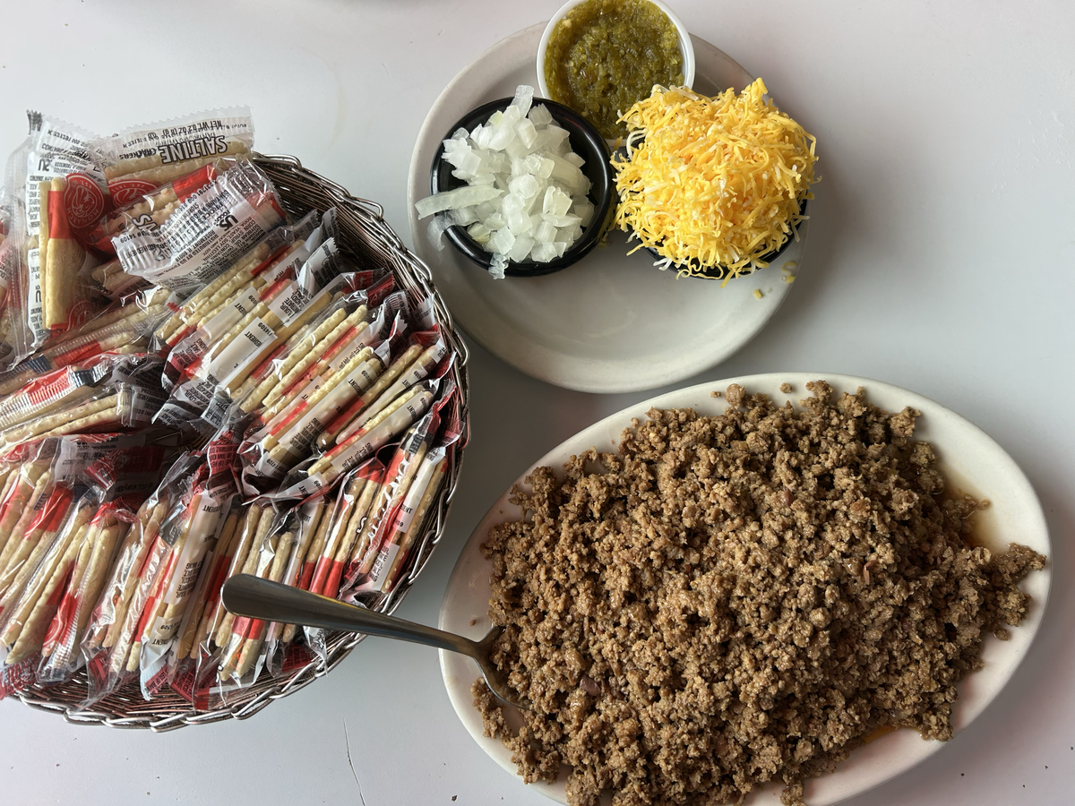 Dixon’s chili is initially served plain, and customers can dress it up with a myriad of toppings.