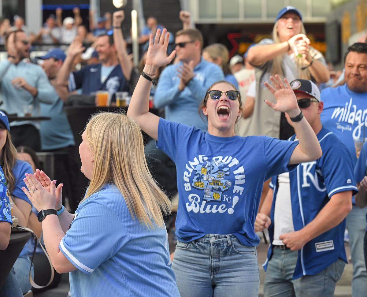 Kansas City Royals fans cheer after the Royals pitched their way out of a bases-loaded jam in the 5th inning of the AL Wild Card game with the Baltimore Orioles. The fans were taking in the game at a watch party at KC Live! at the Power & Light District on Wednesday, Oct. 2, 2024.