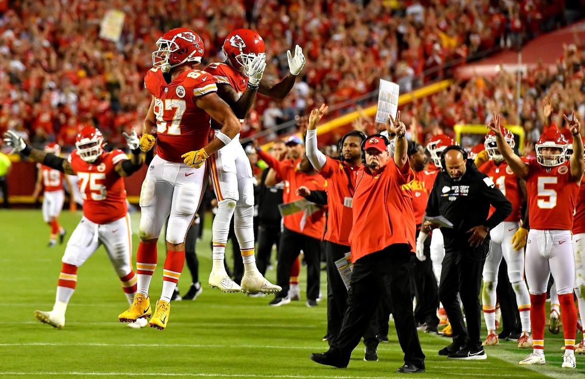 After scoring his thrid touchdown of the game, the Chiefs’ Trvis Kelce (87) had a mid-air celebration with teammate Mecole Hardman during the second half of Monday night’s game at Arrowhead Stadium. Kansas City prevailed, 30-29.