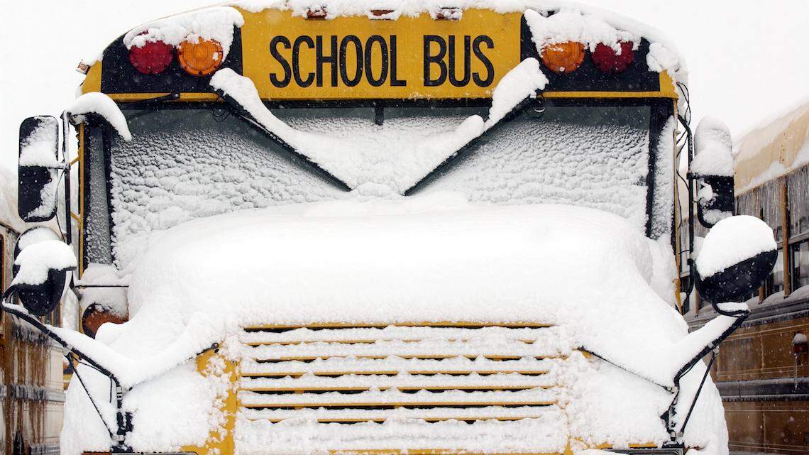 School districts across the Kansas City area canceled classes or will have distance learning as freezing drizzle and cold turned roads icy.