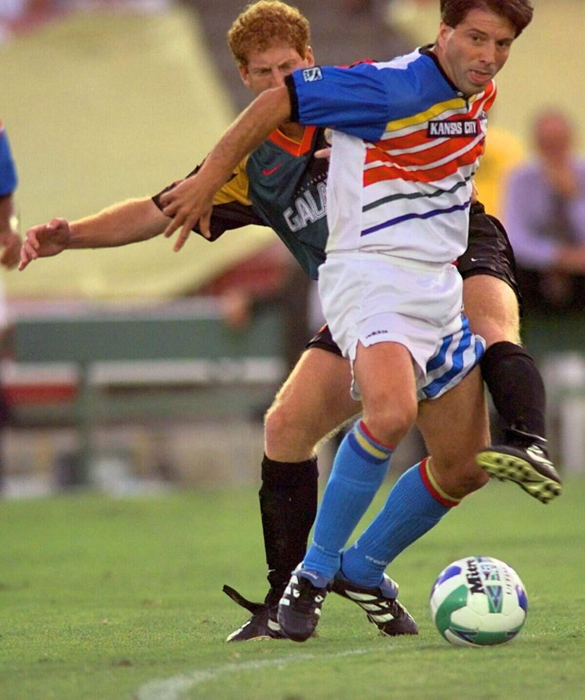 Kansas City Wiz midfielder Preki (right) battles Los Angeles Galaxy defenseman Dan Calichman in the first half of their Major League Soccer match on Aug. 21, 1996, in Pasadena, Calif.
