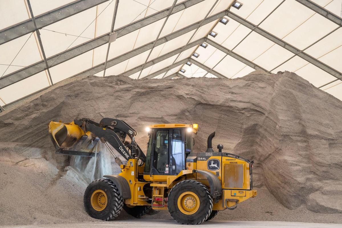 An employee of the Kansas City Public Works Department readied the salt for the snowplows as the city prepared for a major winter storm Saturday, Jan. 4, 2025, at the departments’ salt dome in northeast Kansas City. The city is prepared for one of its largest winter storms in recent years with 40,000 tons of salt, 8,000 tons of IceBan, 36,000 gallons of calcium chloride, 300 snowplows, and 400 drivers ready to keep roads clear.