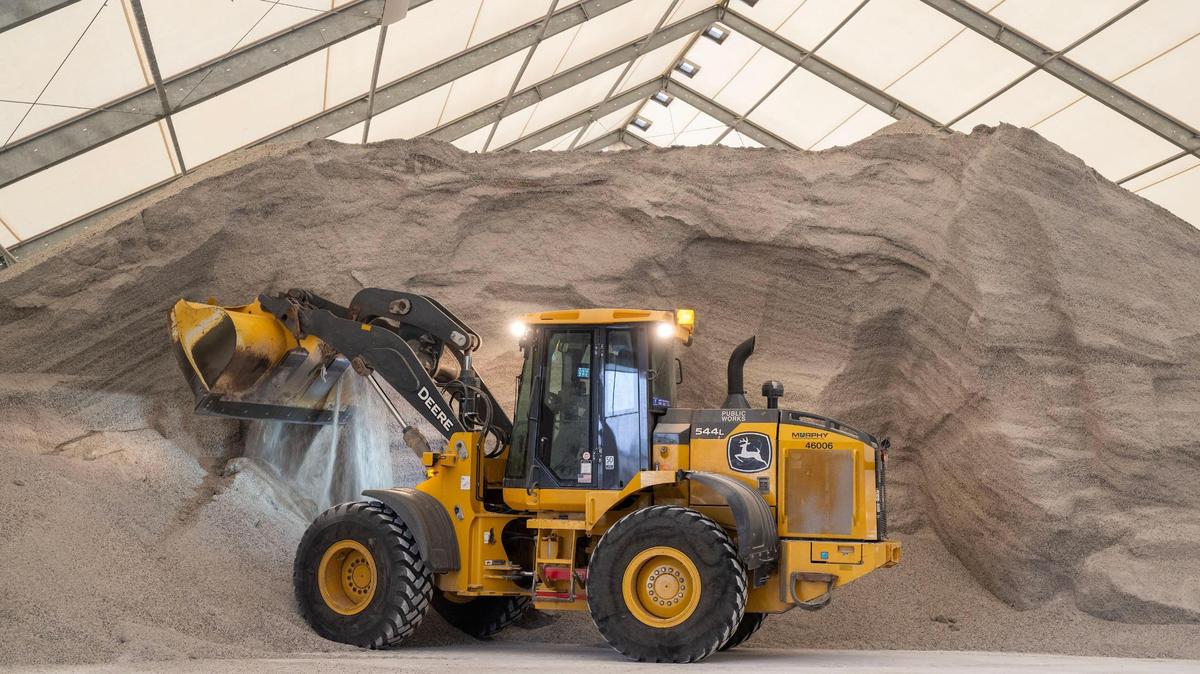 An employee of the Kansas City Public Works Department readied the salt for the snowplows as the city prepared for a major winter storm Saturday, Jan. 4, 2024, at the departments’ salt dome in northeast Kansas City. The city is prepared for one of its largest winter storms in recent years with 40,000 tons of salt, 8,000 tons of IceBan, 36,000 gallons of calcium chloride, 300 snowplows, and 400 drivers ready to keep roads clear.