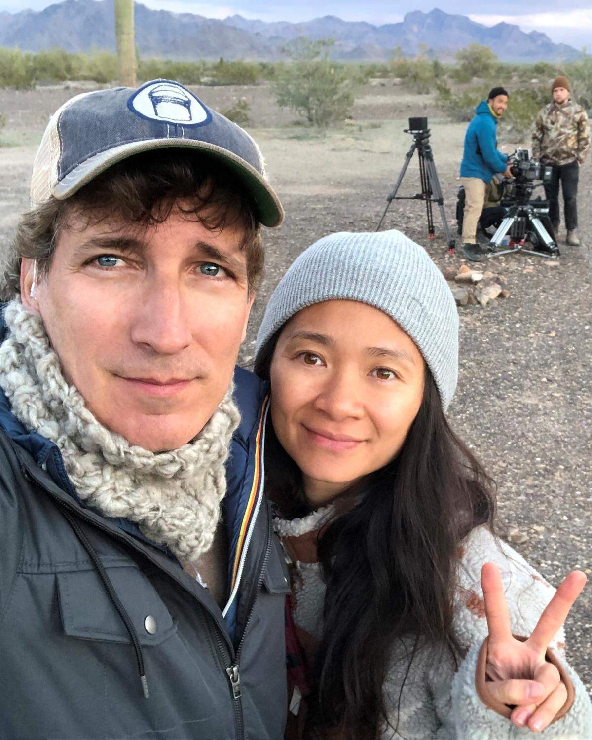 Producer Peter Spears and director Chloe Zhao on the set of “Nomadland.”