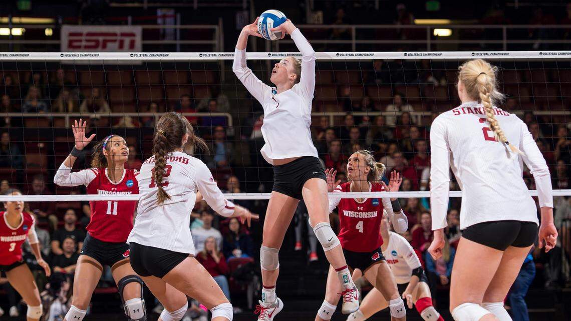 Stanford’s Jenna Gray (center) and Audriana Fitzmorris, at left (also in white) helped lead the Cardinal to another national championship in volleyball last weekend in Pittsburgh.