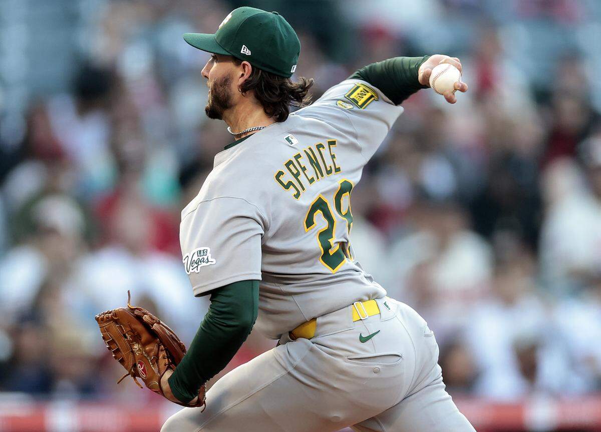 Mitch Spence #28 of the Athletics throws against the Los Angeles Angels in the first inning at Angel Stadium of Anaheim on June 10, 2025 in Anaheim, California.