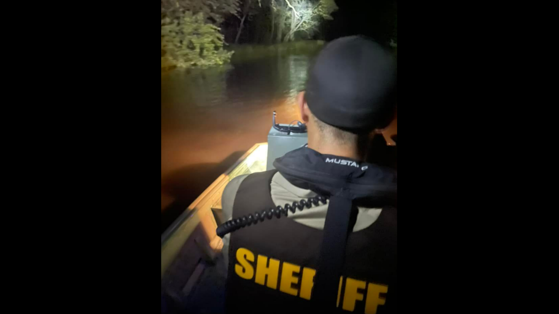 Rescue crews in Michigan set out to save a group of six people stranded by a log jam in the Pere Marquette River.