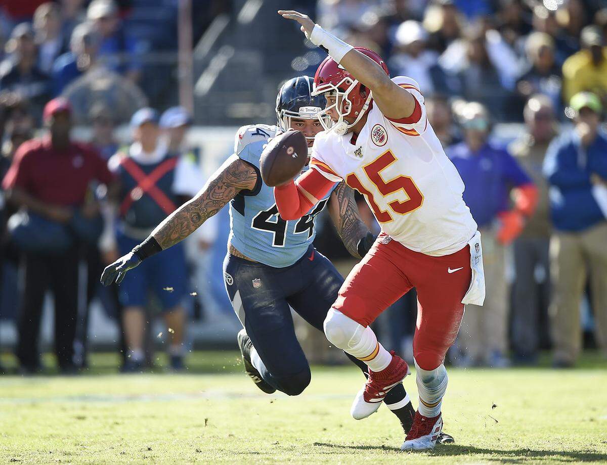 Tennessee Titans outside linebacker Kamalei Correa (44) was after Kansas City Chiefs quarterback Patrick Mahomes (15) during the first half of the Kansas City Chiefs game against the Tennessee Titans Sunday, Nov. 11, 2019, at Nissan Stadium in Nashville, Tennessee.