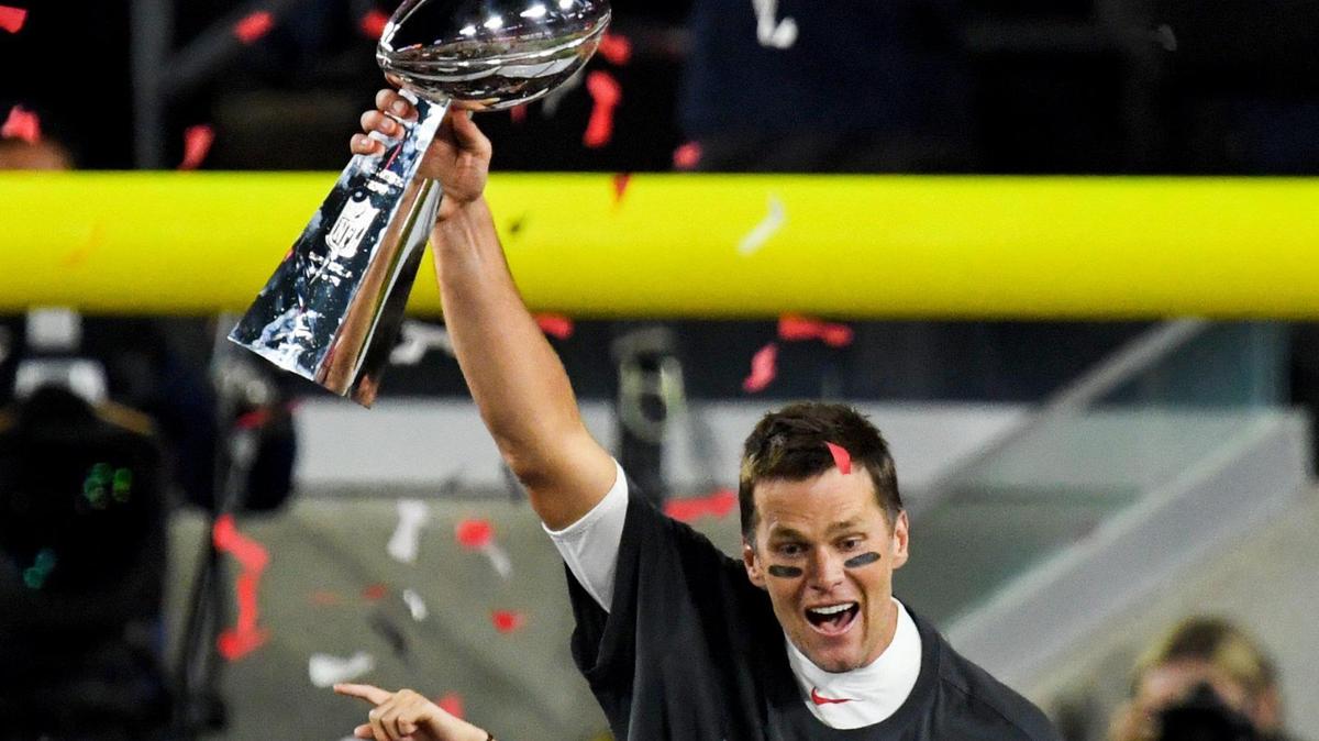 Tampa Bay Buccaneers quarterback Tom Brady raises the Vince Lombardi trophy after beating the Kansas City Chiefs 31-9 to win Super Bowl LV at Raymond James Stadium in Tampa, Sunday, Feb. 7, 2021.