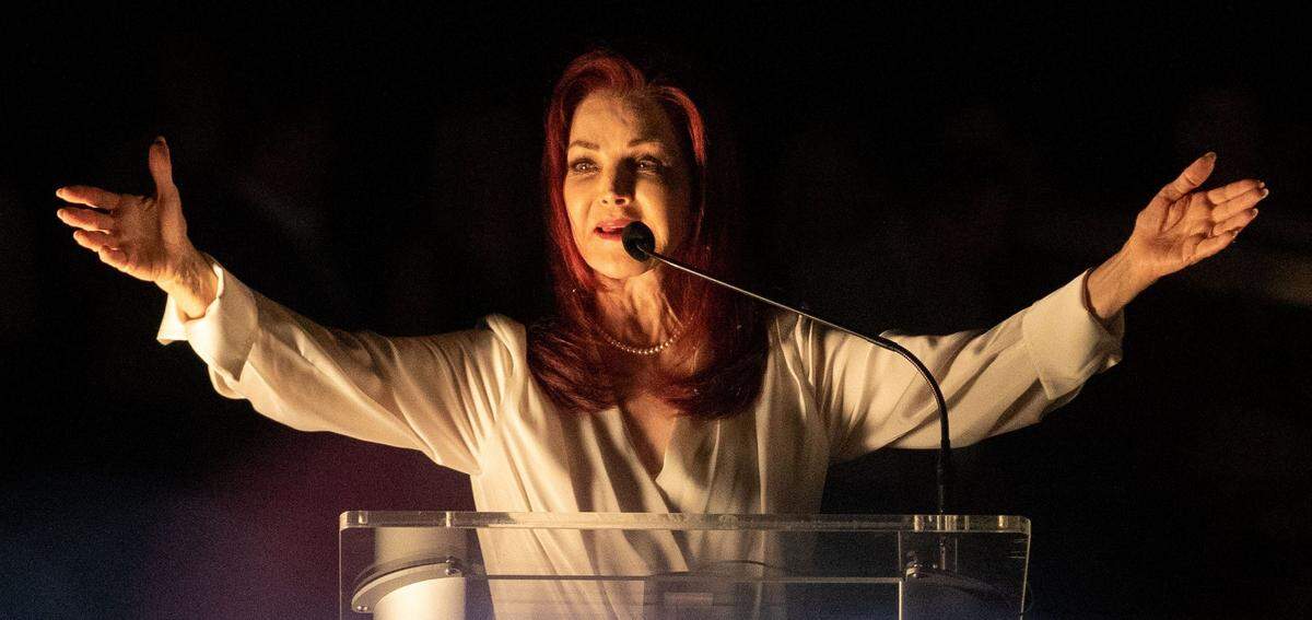 Priscilla Presley speaks during the Candlelight Vigil ceremony marking the 45th anniversary of Elvis Presley's death Monday, Aug. 15, 2022, at Graceland in Memphis.
