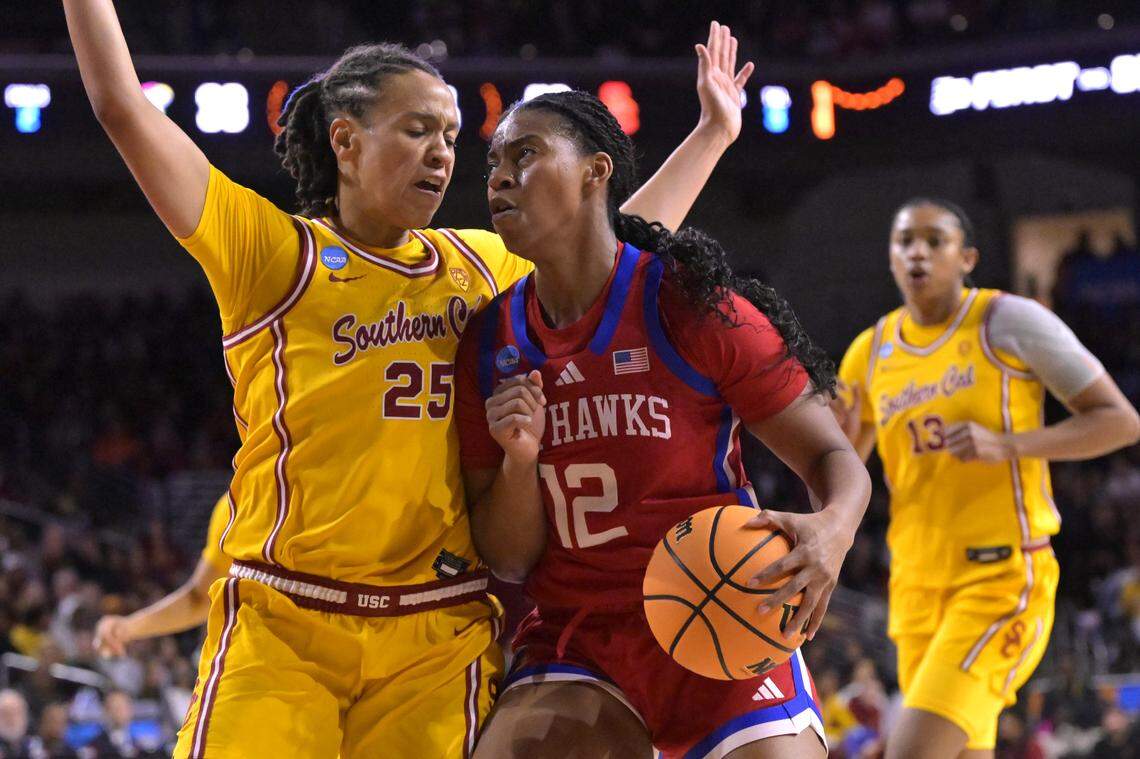 McKenzie Forbes of the USC Trojans defends S'Mya Nichols of the Kansas Jayhawks during the second half of the NCAA Women's Basketball Tournament at Galen Center on March 25, 2024, in Los Angeles.