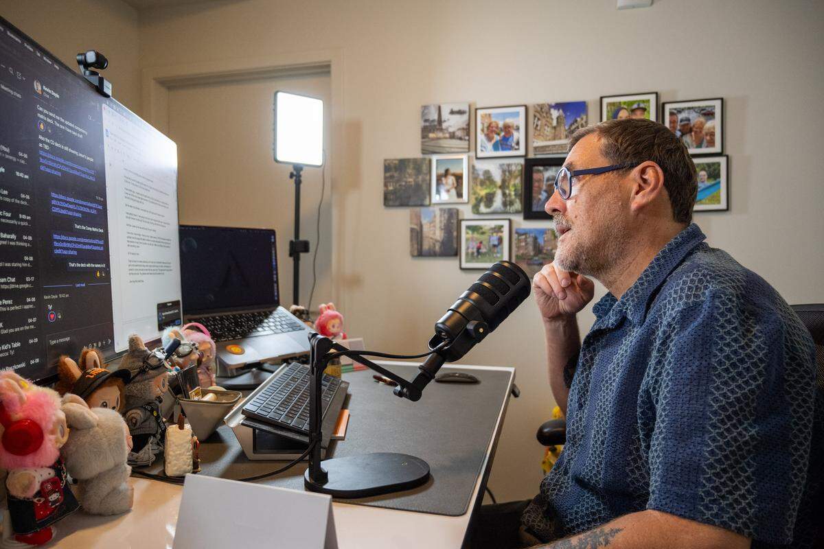 Kris Saim reads thru lines for his podcast, Dying Out Loud, at his home on Friday, April 10, in Kansas City. Saim has Stage 4 terminal cancer and is recording a podcast that talks about death and features him having conversations with friends and family.