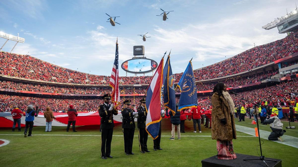 Lanell Lightfoot of the Maryland and Washington, DC area, performs the national anthem while the Kansas City, Kansas Police Department will presents the colors. The flyover of four CH-47 Chinooks of the 158th Aviation Battalion, before the Kansas City-Texans game Saturday, Jan. 18, 2025, at GEHA Field at Arrowhead Stadium.