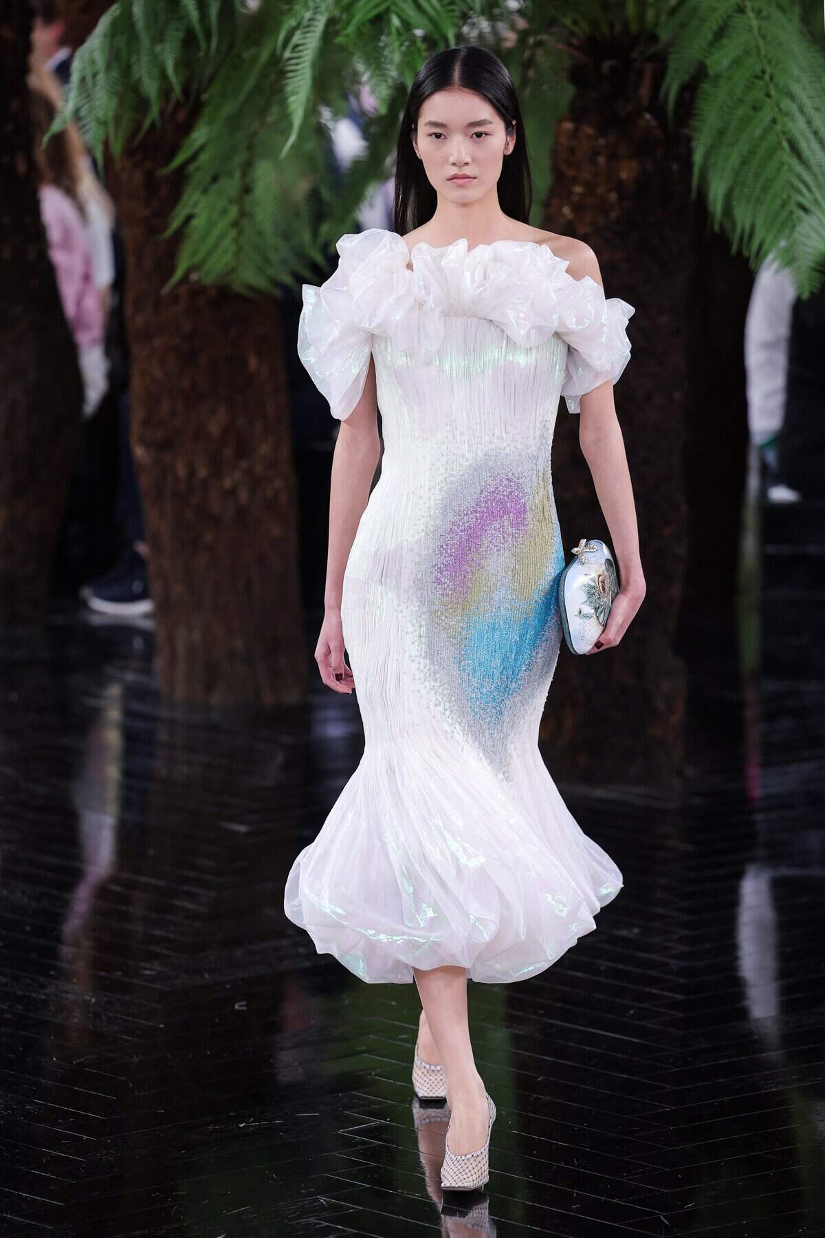 A model presents a creation for Christian Dior for the Women Haute Couture Fall/Winter 2026-2027 collection as part of the Paris Fashion Week, in Paris, on July 6, 2026.