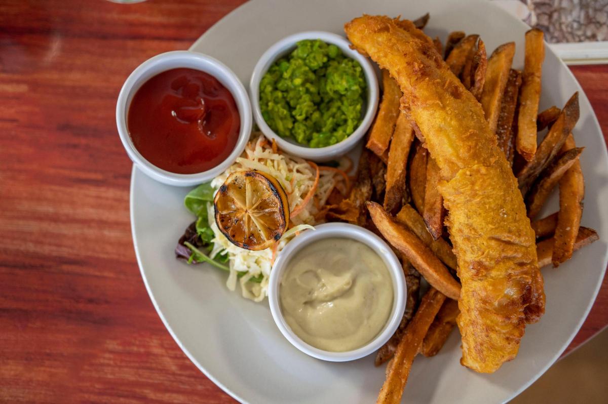 The most popular order at Brady & Fox in East Brookside is traditional fish and chips, which comes with house fries, coleslaw, tartar sauce and mushy peas.