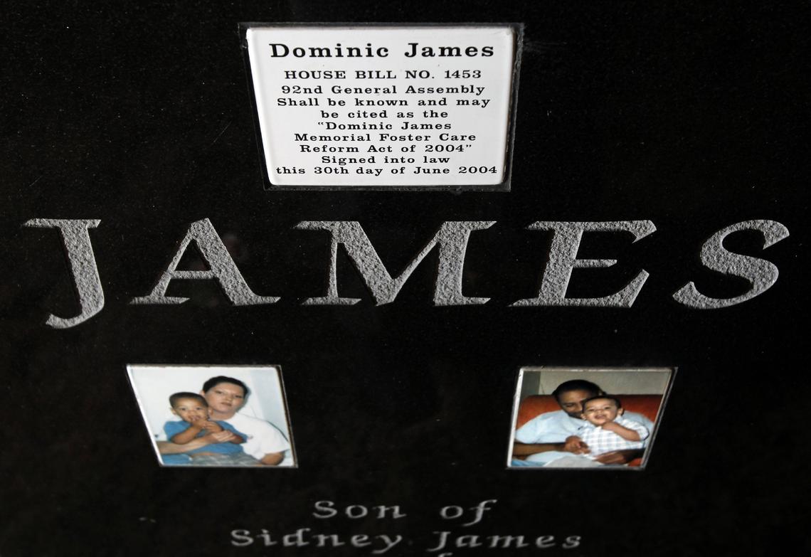 Missouri overhauled its foster care system after 2-year-old Dominic James was shaken to death in 2002 while with a foster family. The back of his headstone shows the Dominic James Memorial Foster Care Reform Act that was signed into law in 2004.