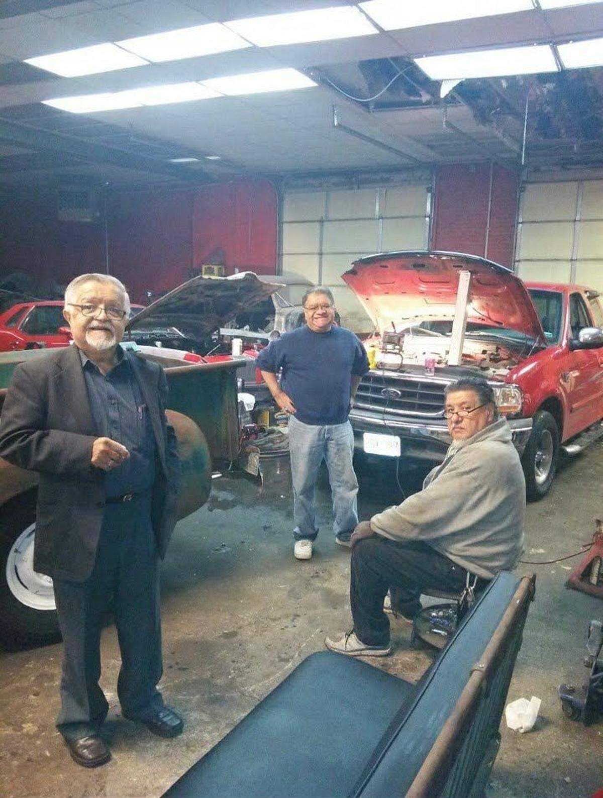 Charles Lona ran his business, Lona and Sons Hydraulics, with sons Chris and Tim Lona. They refocused the company to build custom lowrider cars. Charles Lona, right, is pictured in the shop with brother William “Memo” Lona, center.