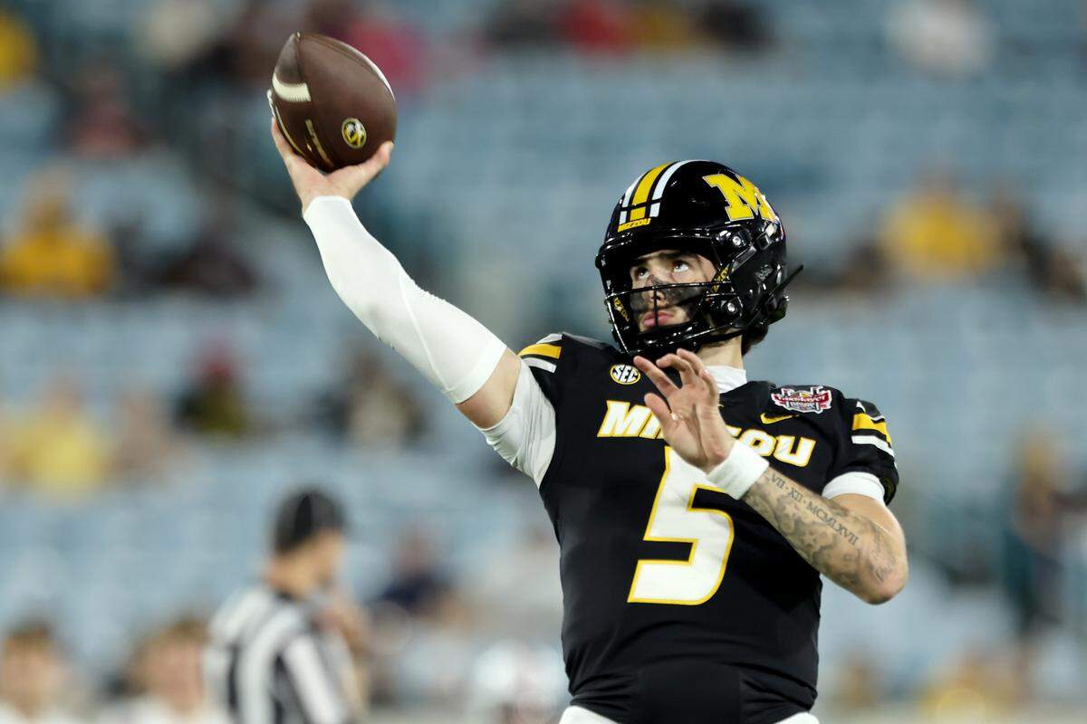 Matt Zollers #5 of the Missouri Tigers warms up before the 2025 TaxSlayer Gator Bowl against the Virginia Cavaliers at EverBank Stadium on December 27, 2025 in Jacksonville, Florida.