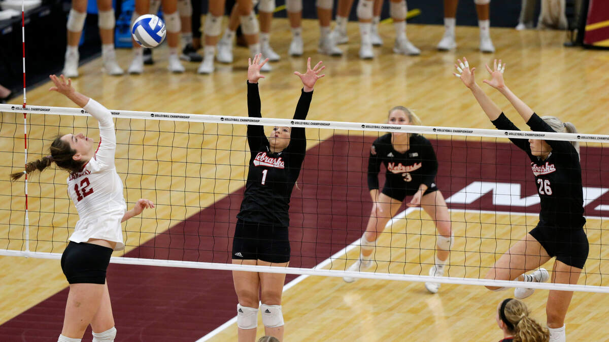 Stanford’s Adriana Fitzmorris, who went to St. James Academy, worked to spike one on the Stanford defense in the NCAA championship match on Saturday in Minneapolis.