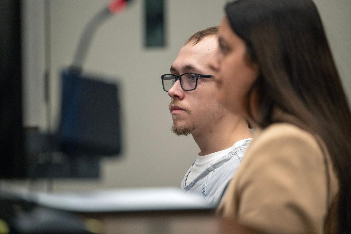 Jace Hanson, 21, a former employee of the Hereford House restaurant in Leawood, appeared with his attorney in Johnson County District Court Thursday, June 6, 2024, in Olathe. Hanson has been charged with 22 felony counts of criminal threat for allegedly contaminating food and one count of criminal damage. Hanson also faces 10 felony counts of sexual exploitation of a child for allegedly possessing child sexual abuse materials.